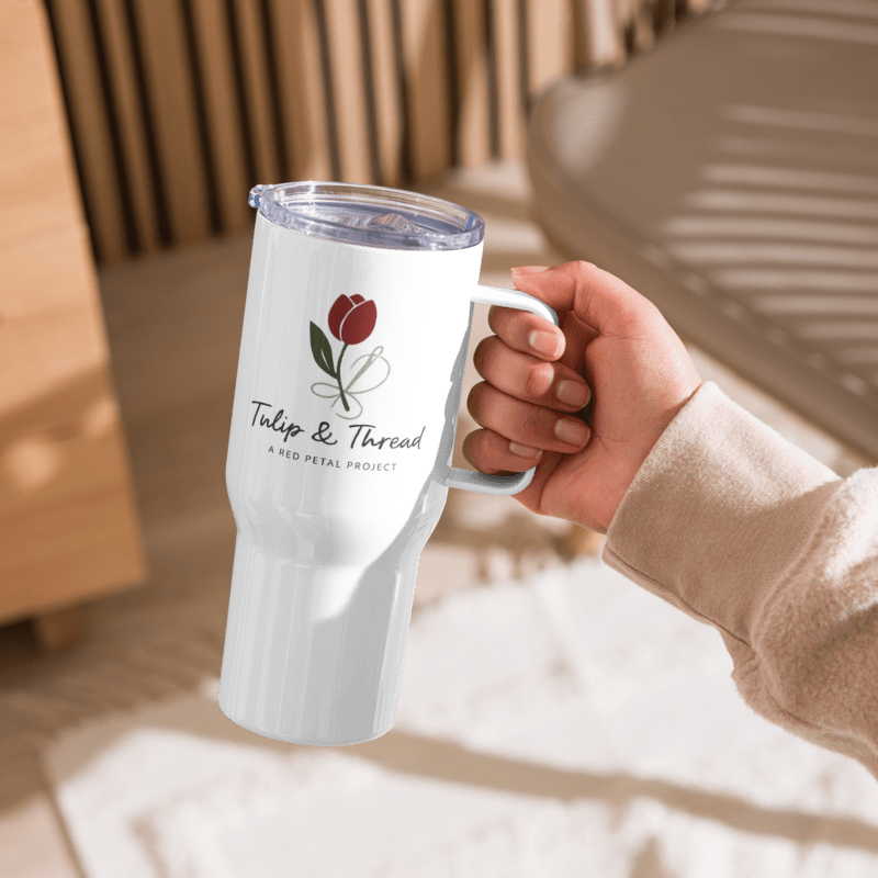 Tulip & Thread Travel mug with a handle