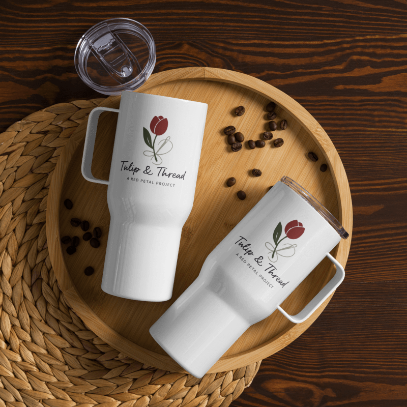 Tulip & Thread Travel mug with a handle